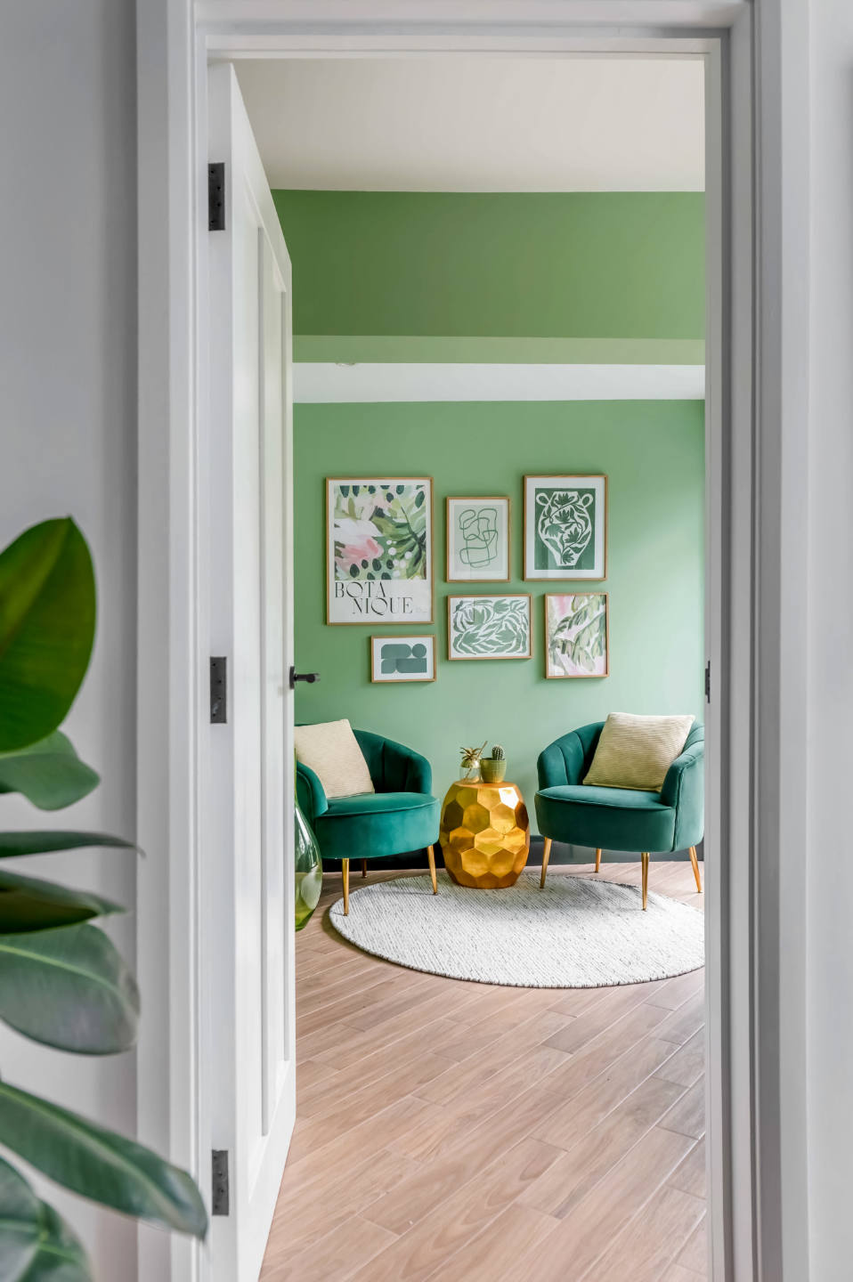 view-through-doorway-to-green-sitting-area-epsom.jpg